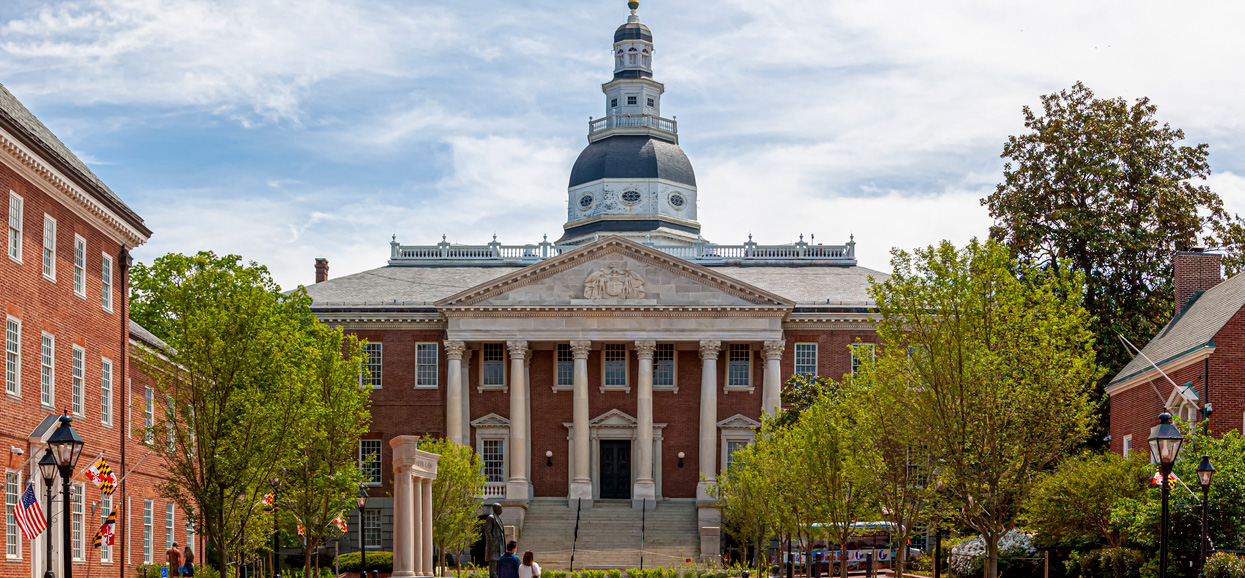Annapolis State House during the day with people outside